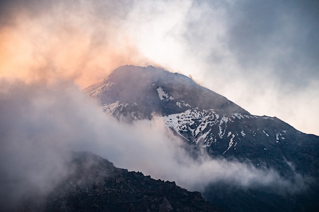 Nature of Kamchatka - beautiful volcanic landscape: view on Kamen Volcano, active Klyuchevskoy Volcano and active Bezymianny Volcano.