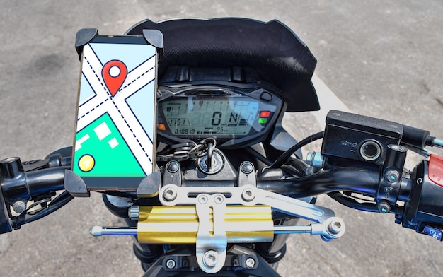 Navigate map on display smartphone on handle bar motorcycle