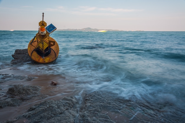 Photo navigation buoy aground on the beach