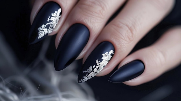 Photo navy blue nails with silver floral design