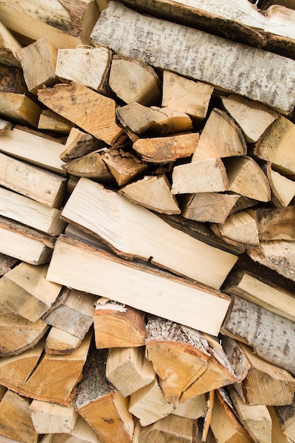 Neatly stacked chopped sticks of dry firewood