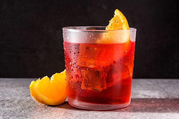 Negroni cocktail with piece of orange