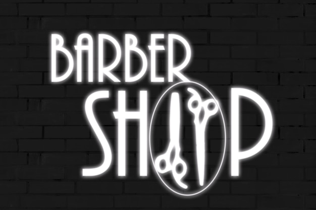 Neon sign with the inscription barber shop.