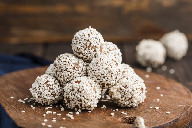 Nergy balls of nuts oats and dates with sesame seeds