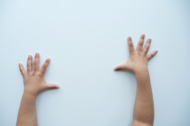 nervous child hand on light white background