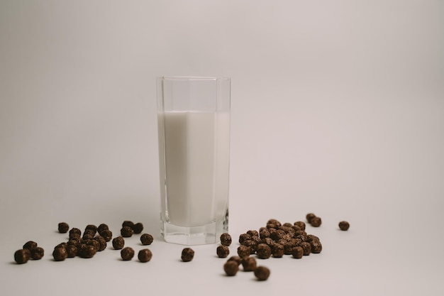 nesquik chocolate balls and a glass of milk