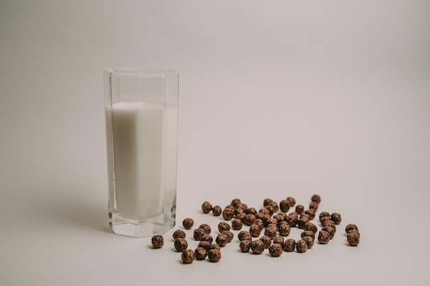 nesquik chocolate balls and a glass of milk