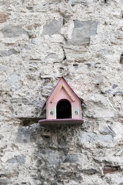 Nesting box on stone wall