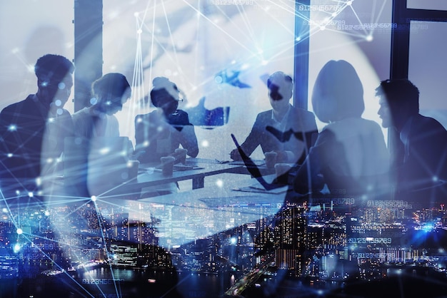 Network background concept with business people silhouette and city skyline at night Double exposure and network effects