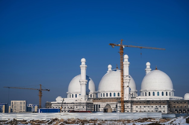 New big white mosque under construction for the Muslim faith in Kazakhstan