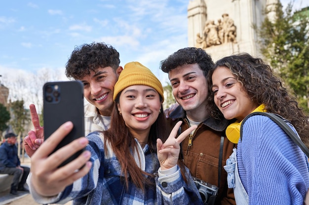 New city new memories Friends capture a moment in front of a famous monument