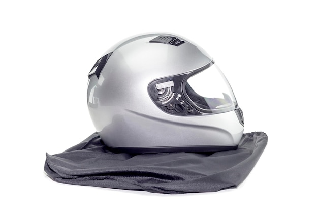 New contemporary silver motorcycle helmet on a white background closeup