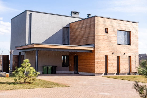 A new house with a garden in a rural area.