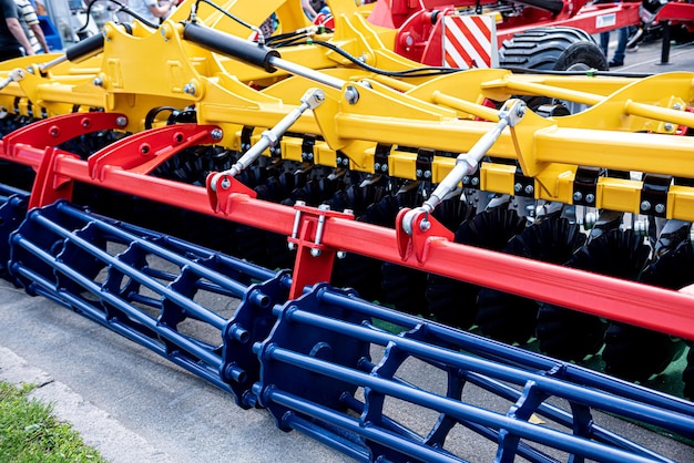 Photo new modern agricultural machinery and equipment details