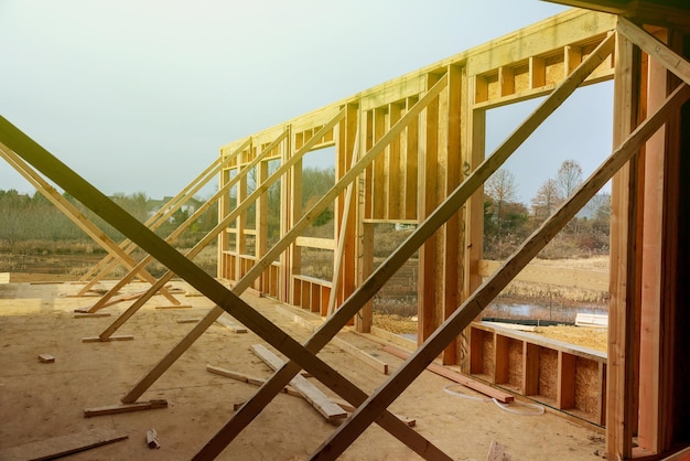 New room with a view new house construction interior with exposed framing