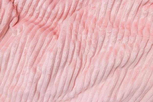 New soft pink fabric with waves and lines Abstract texture background closeup