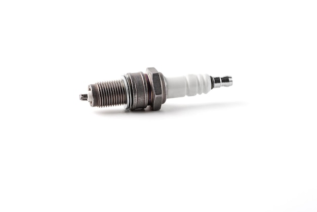 New spark plug on white background.