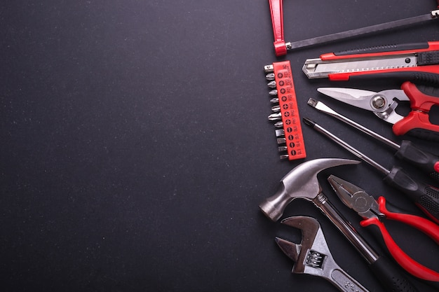 New square black tool box on black granite board background