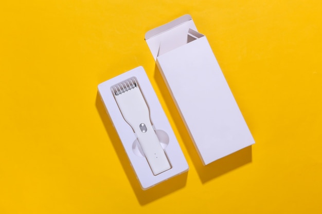 New Wireless Hair Clipper in box on yellow bright