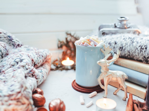 New year atmosphere and candle Christmas toys with cup of coffee 