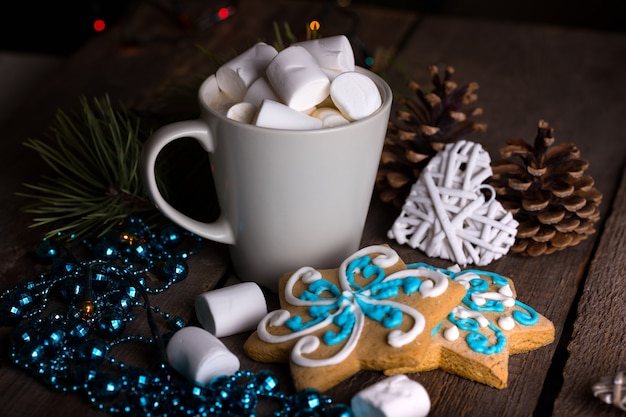 New Year card  - cup of coffee and marshmallows. gingerbread and Christmas decorations