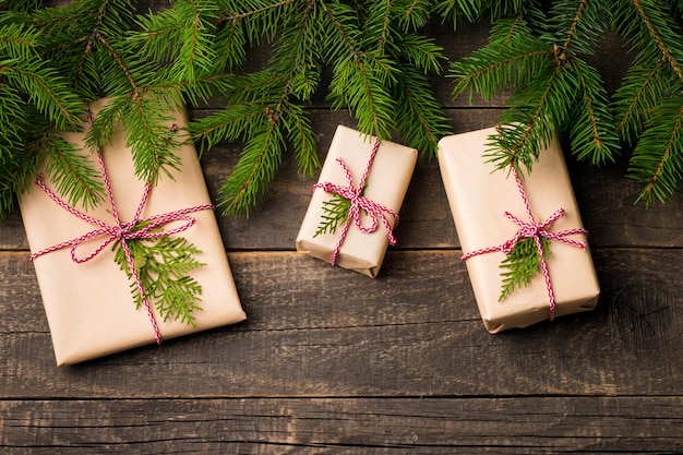 New Year and Christmas gifts under a tree. Winter holidays concept.