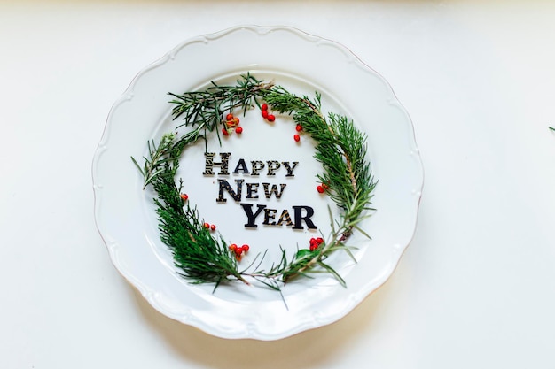 New Year Christmas porcelain plate Party decoration christmas wreath flat lay top view