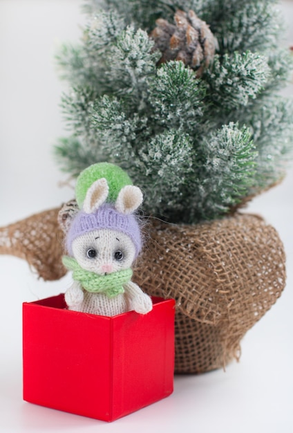 The new year is 2023 rabbits Knitted children's toy a gift for a holiday