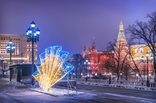 New Year and the Kremlin on a winter night and a fan of lights Moscow