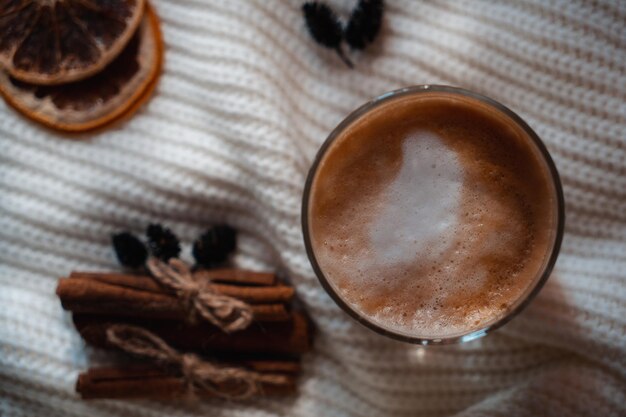 New Year's cup of coffee on a white knitted blanket