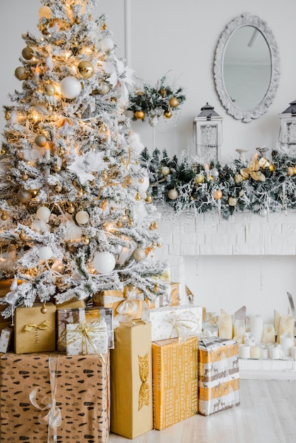 New Year's interior with a fir tree in white tones