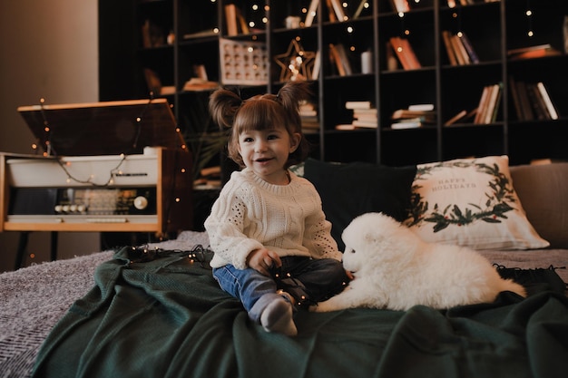 New Year's photo session with a little girl and a puppy