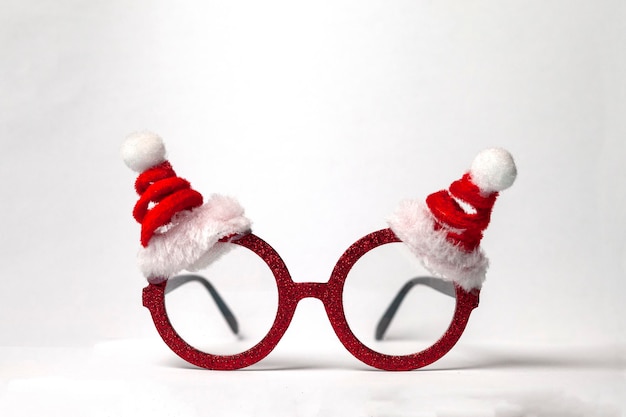 New Year's Santa glasses on a white background Christmas symbol