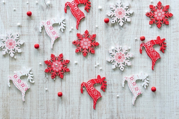 New Years composition Christmas tree decorations balls on a wooden background Flat lay top view