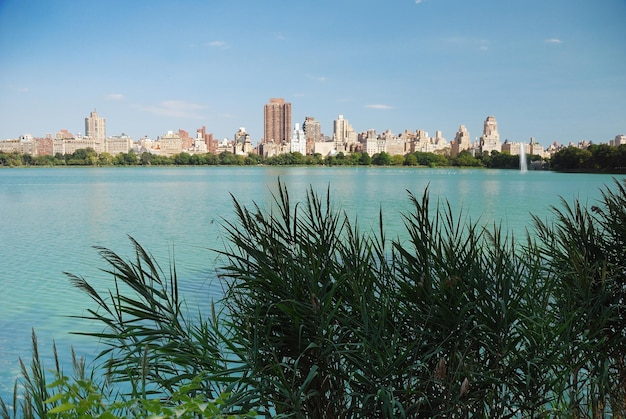 New York City Manhattan skyline with Central Park lake