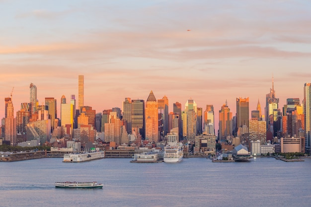 New York City midtown Manhattan sunset skyline panorama view over Hudson River in USA