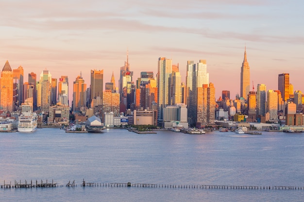 New York City midtown Manhattan sunset skyline panorama view over Hudson River in USA