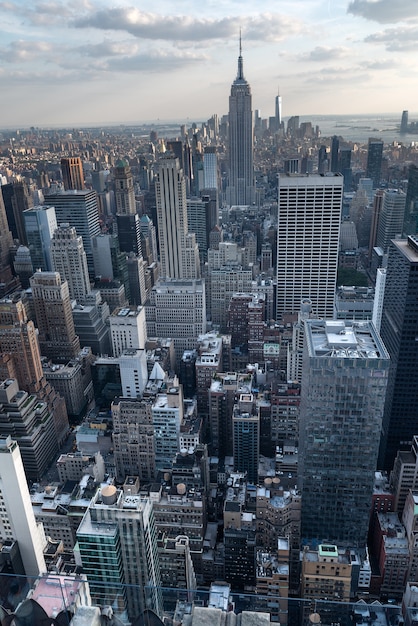 New York City skyline with urban skyscrapers at sunset, USA.