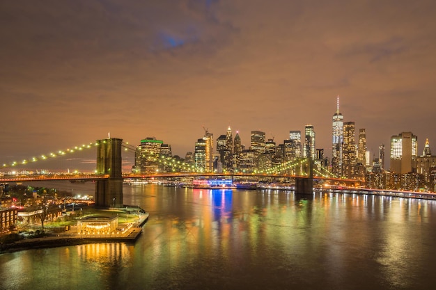 New York Skyline and Brooklyn Bridge at Night