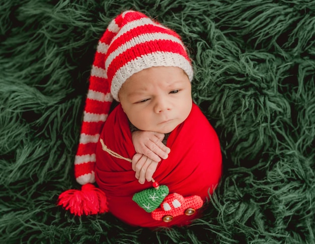 Newborn baby boy studio portrait