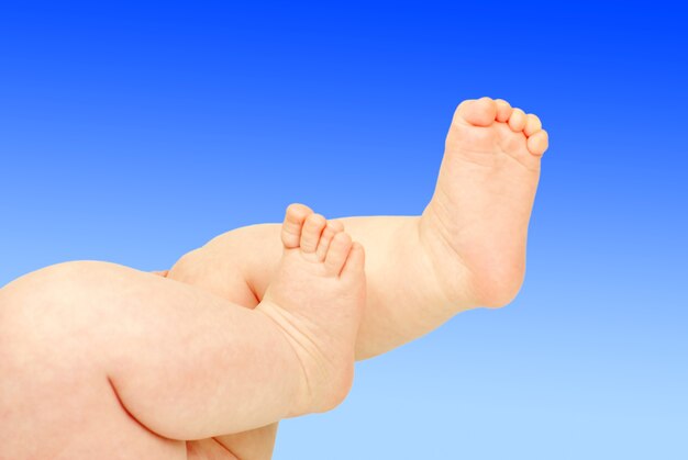 Newborn baby feet isolated on white