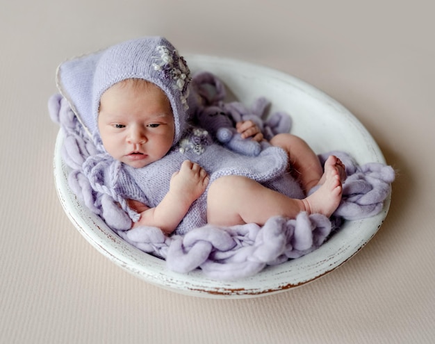 Newborn baby girl studio portrait