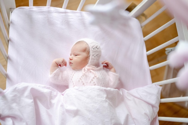 Newborn baby girl studio portrait