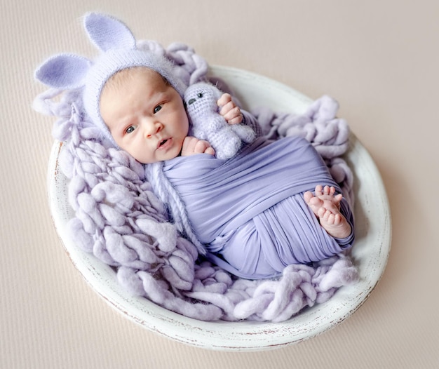 Newborn baby girl studio portrait