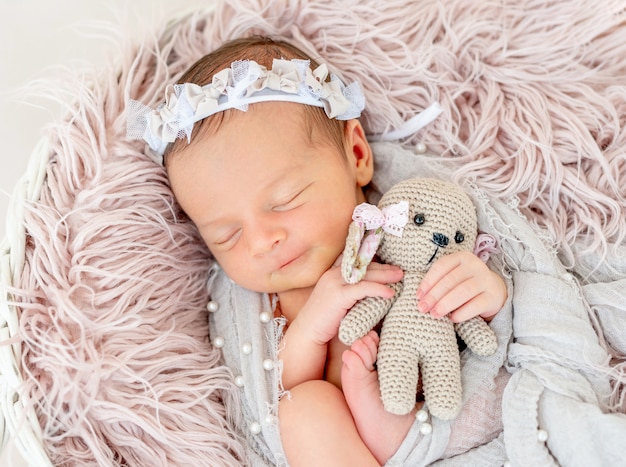 Newborn baby sleeping in the basket