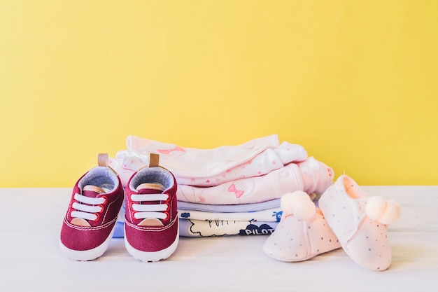 Newborn concept with clothes and shoes