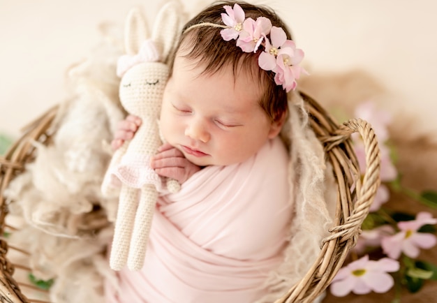 Newborn in floral diadem