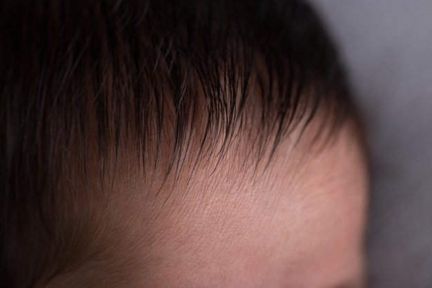 Photo newborn forehead head body part brain top of