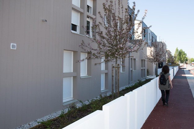 Newly built modern block of flats under blue sky