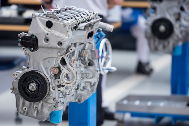 newly manufactured engines in the assembly line in the factory are used to test engine performance and skill training of mechanic.